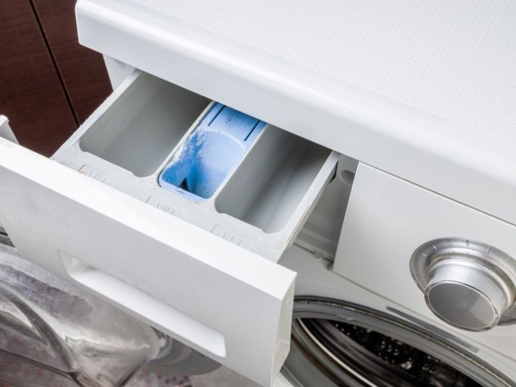 lavatrice con cassetto aperto